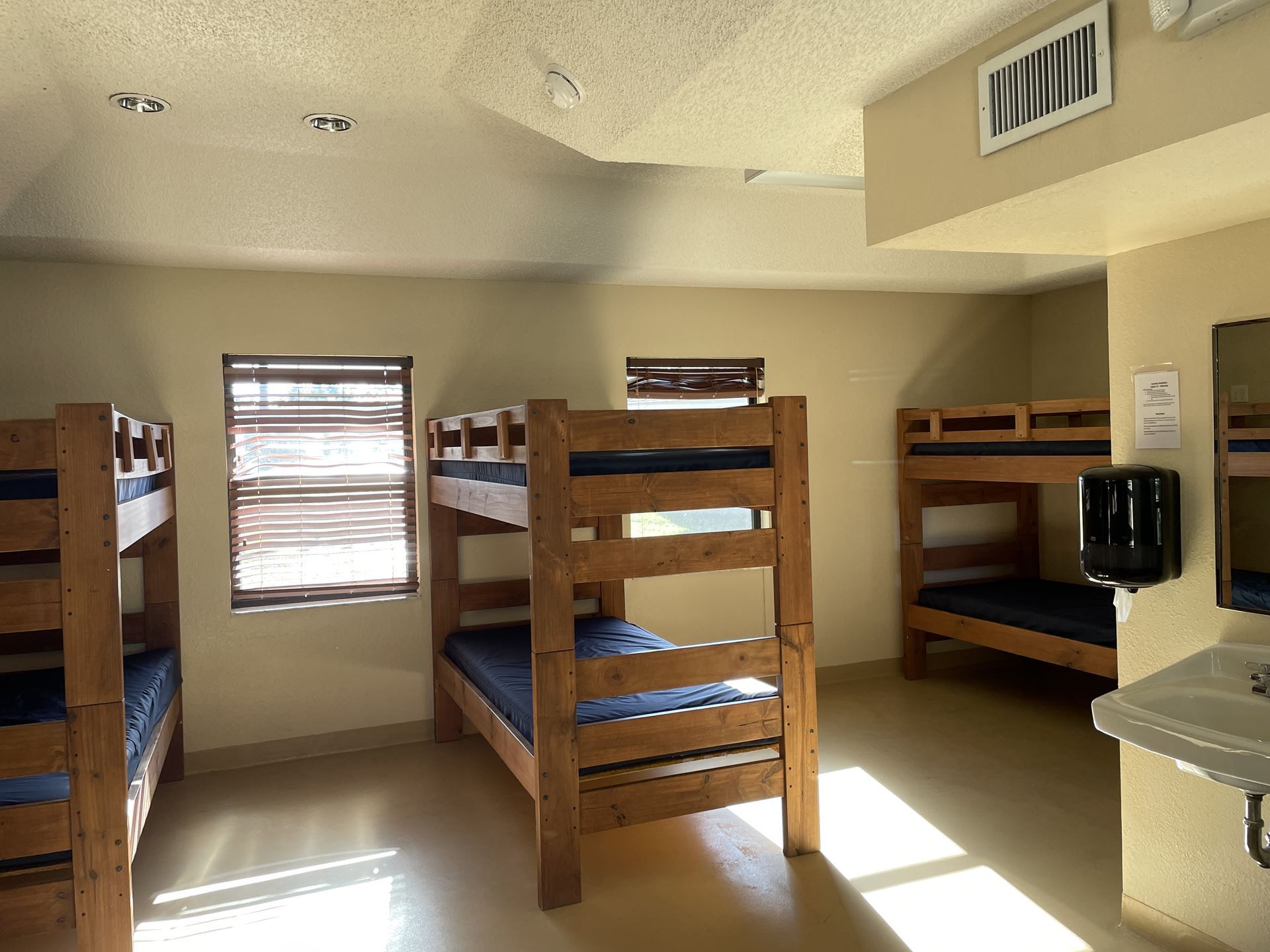 a picture of 3 bunk beds